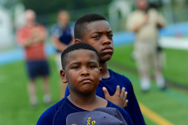 Isaiah Ayers and Maurki James as Cape ball boys.